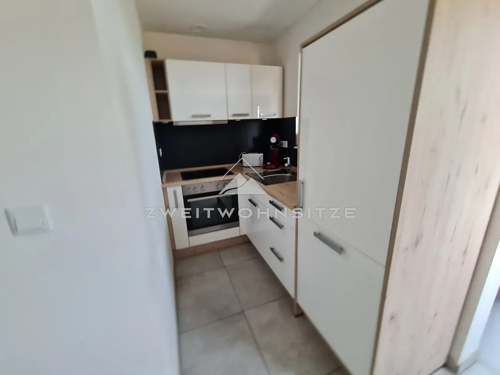 Haus 2a: Einbauküche mit AEG-Geräten