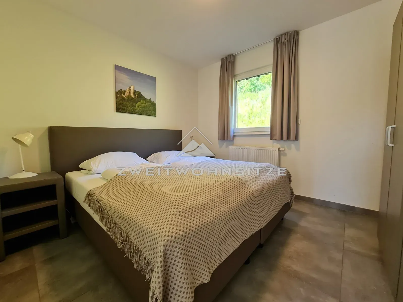Haus 9: Schlafzimmer mit Doppelbett